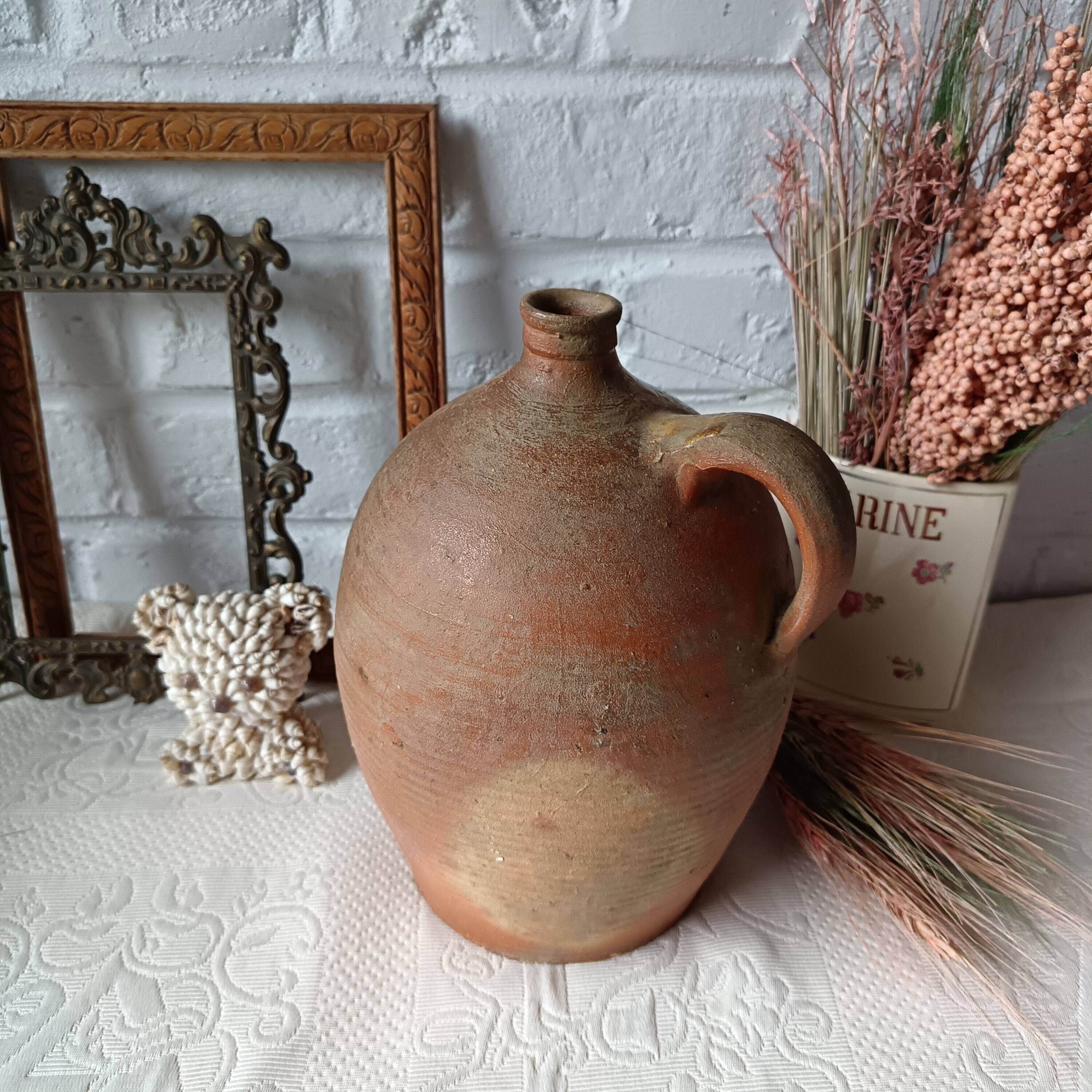 Old beige-brown stoneware jar France
