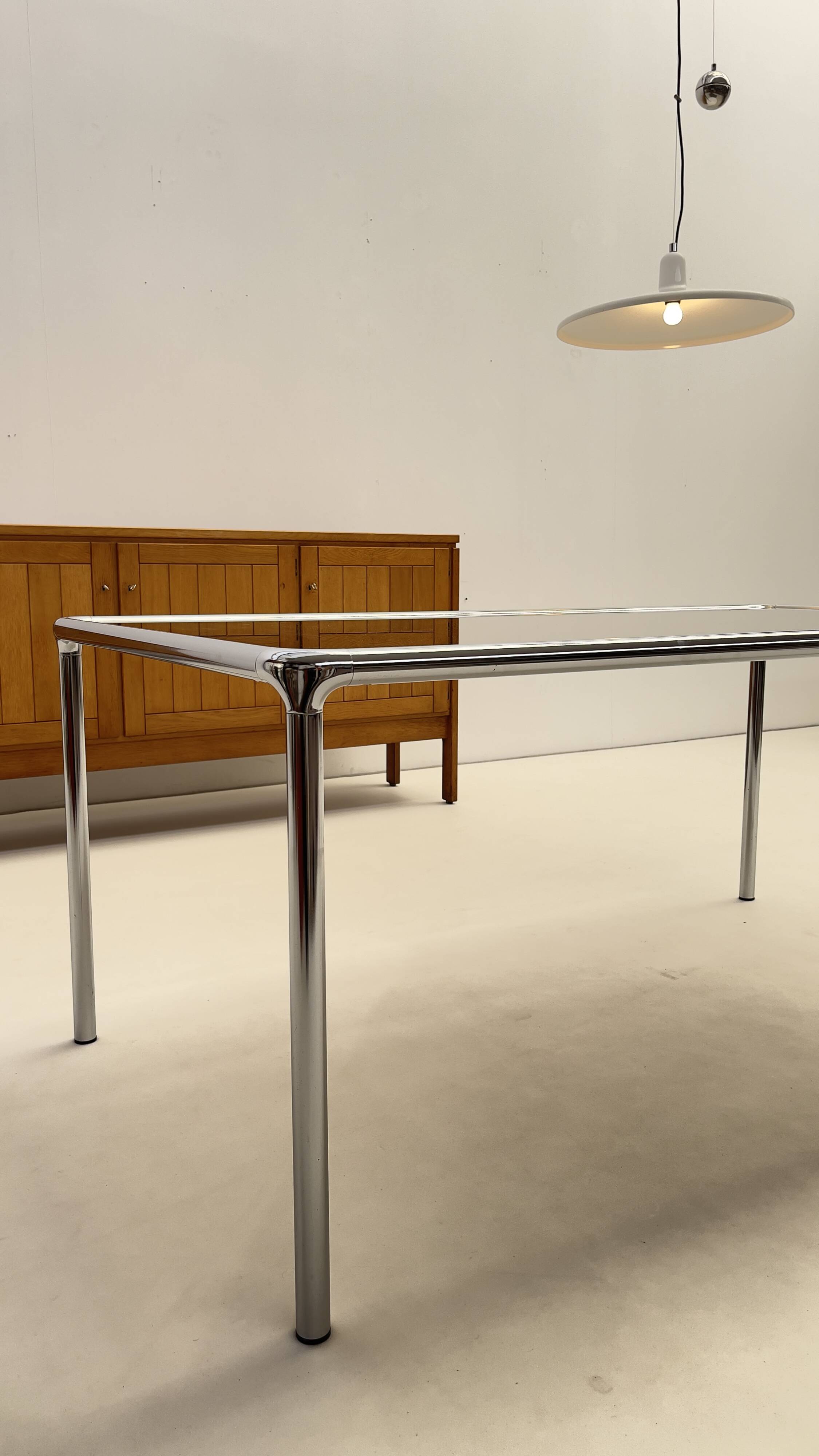 Etienne Fermigier - Dinning table in chrome and smoked glass