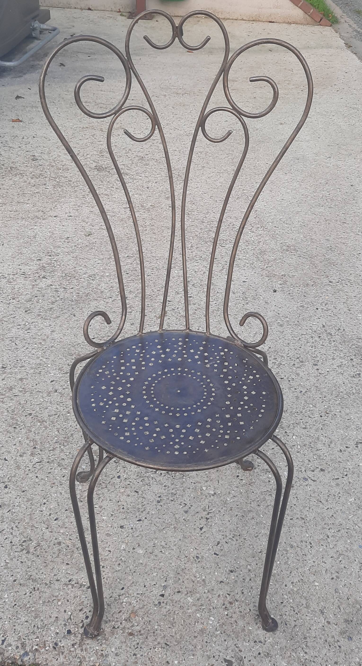 Bent metal chair