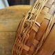 Wicker and wood suitcase