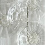 Set of 6 dessert plates, transparent glass with engraved flower pattern.