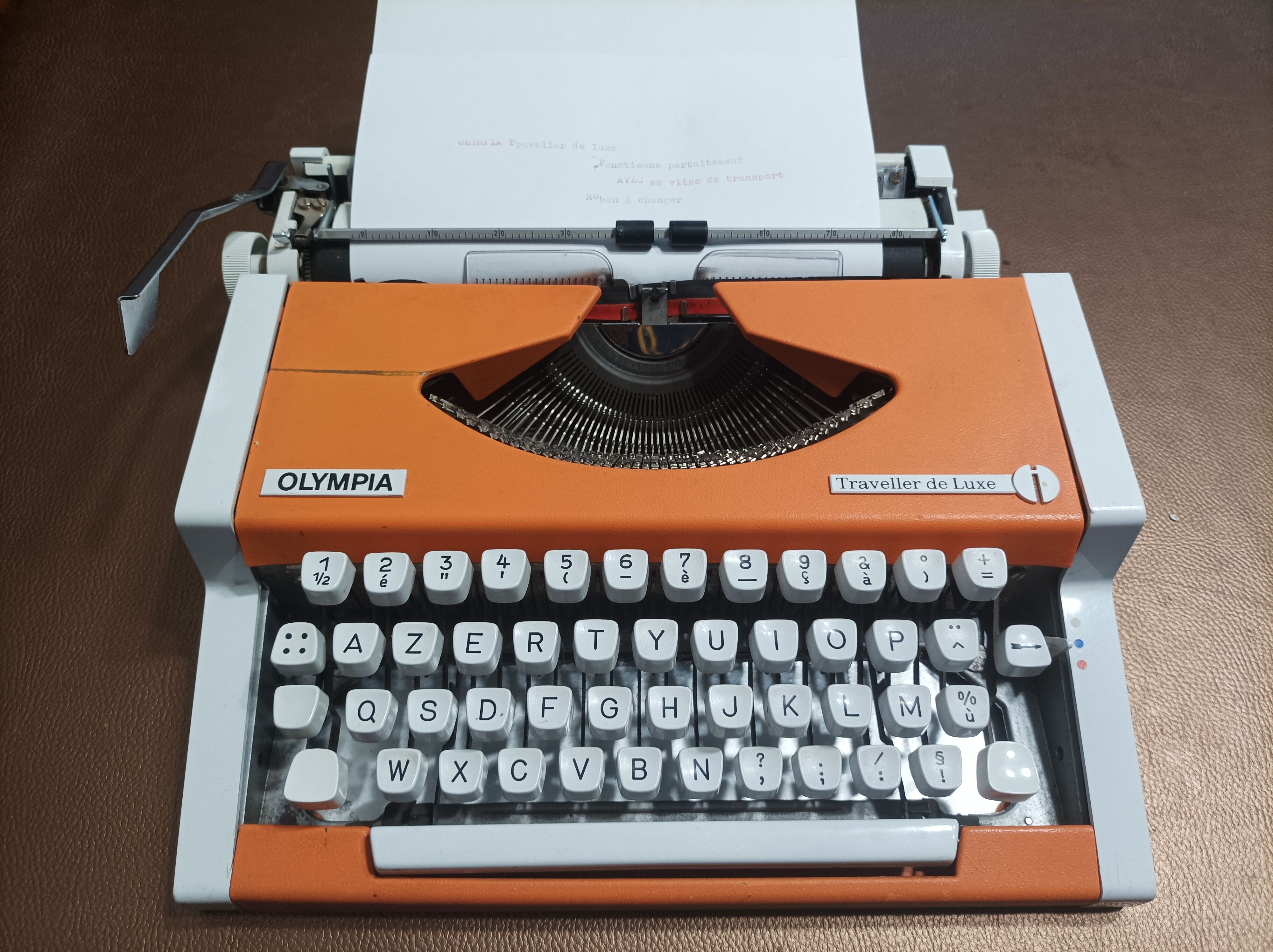 Olympia traveller luxury typewriter orange revised and new ribbon