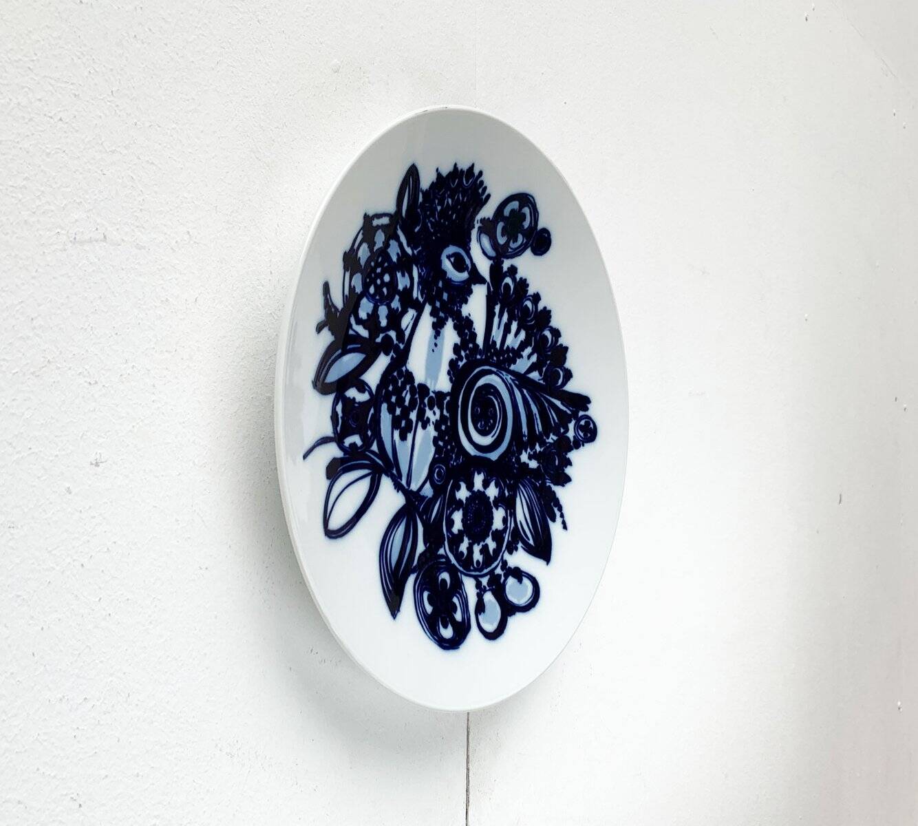 Vintage German peacock wall plate by Bjørn Wiinblad for Rosenthal, 1970s.