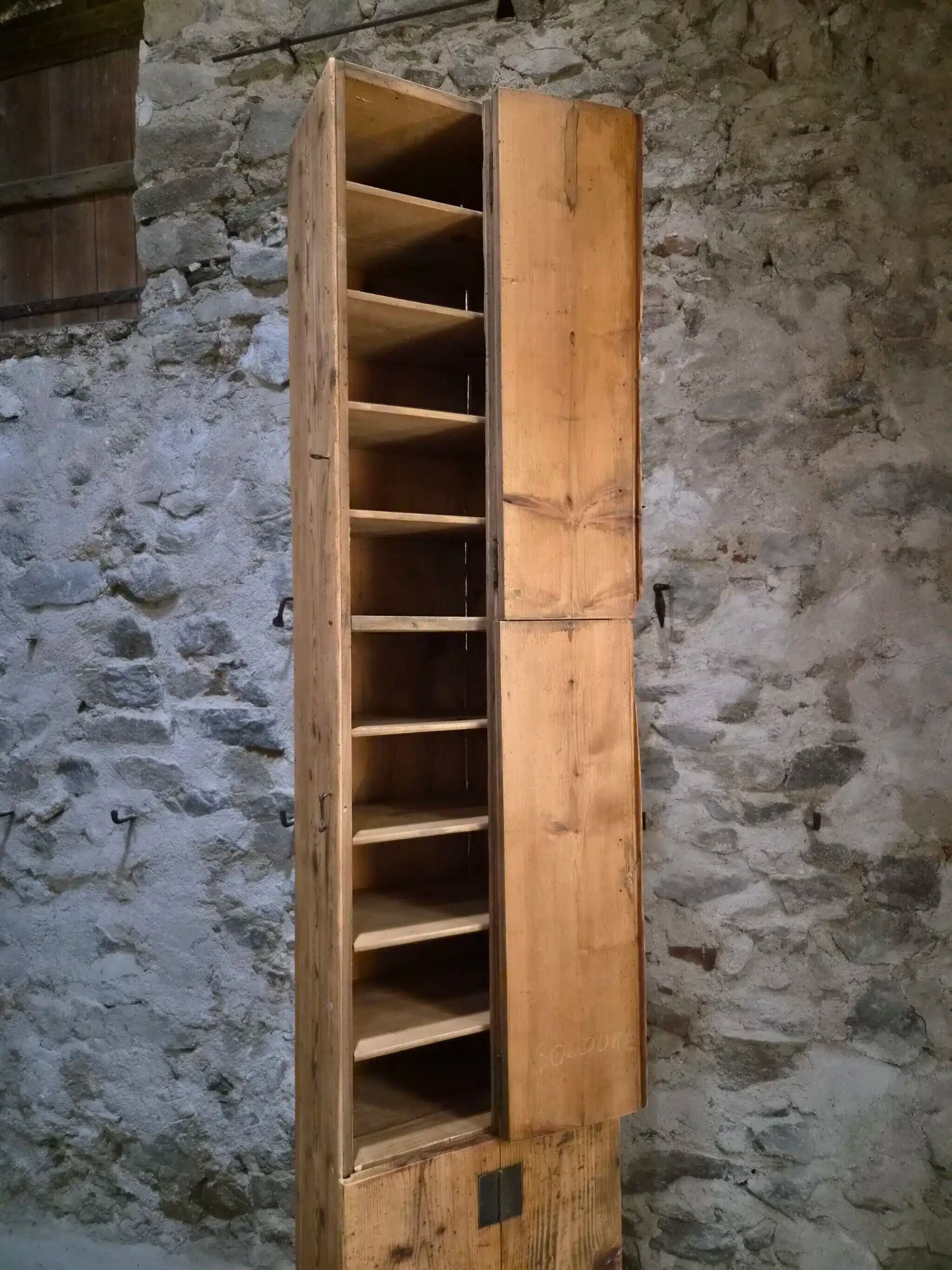 Antique French workshop cabinet in pine with compartments.