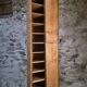 Antique French workshop cabinet in pine with compartments.