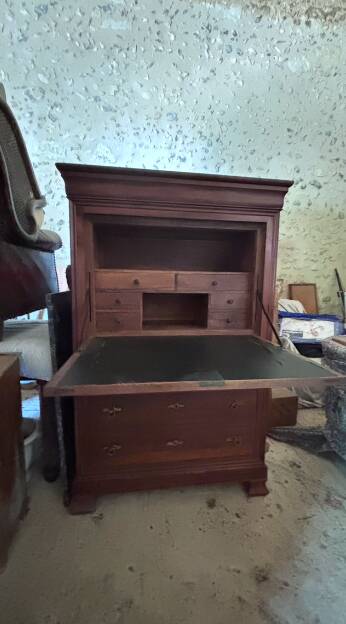 Secretary desk with mahogany and flame veneer.