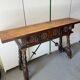 Baroque Spanish console table in carved walnut, 17th-18th century.