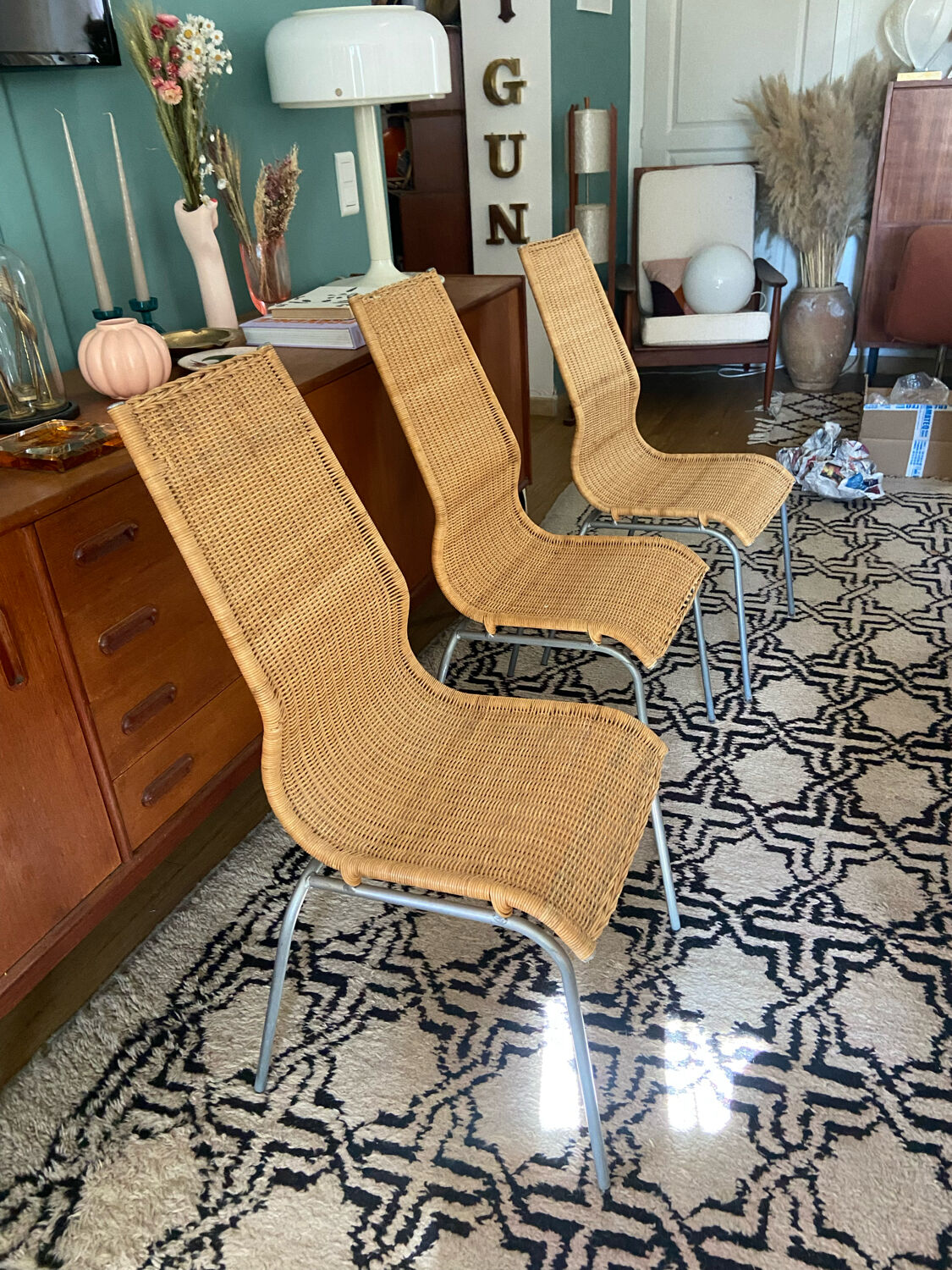 Trio of vintage Ikea rattan and aluminum chairs