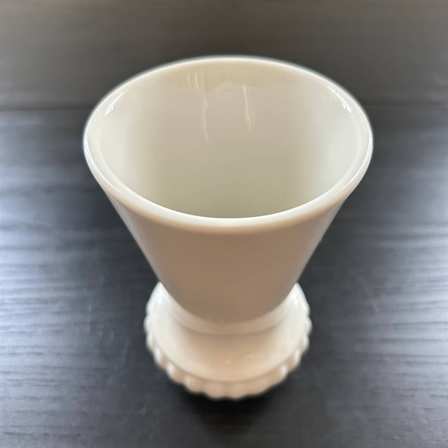 Small ribbed white vase