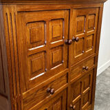 Artisan brutalist oak cabinet with turned knobs, France, 1970s