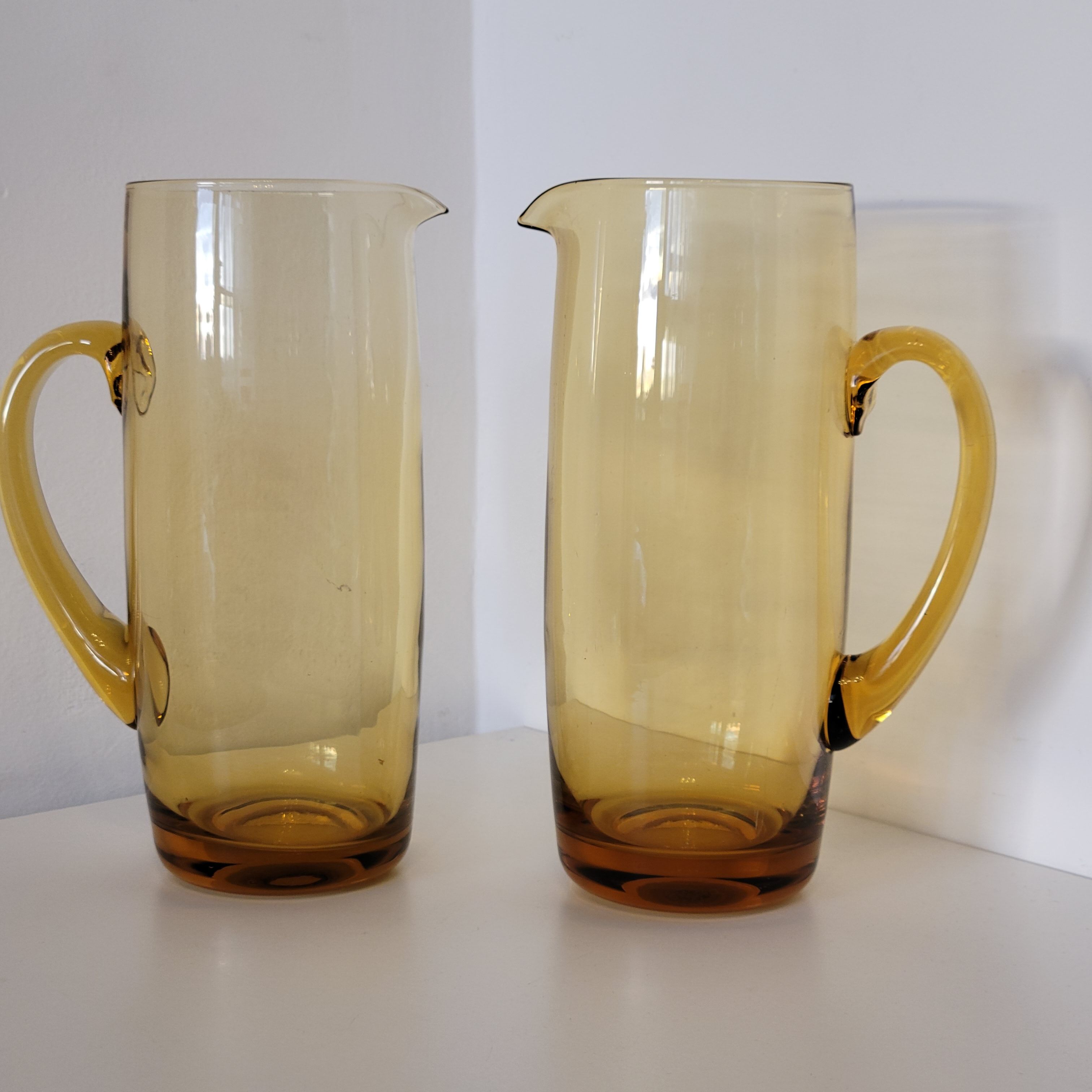 2 carafes in vintage amber yellow blown glass
