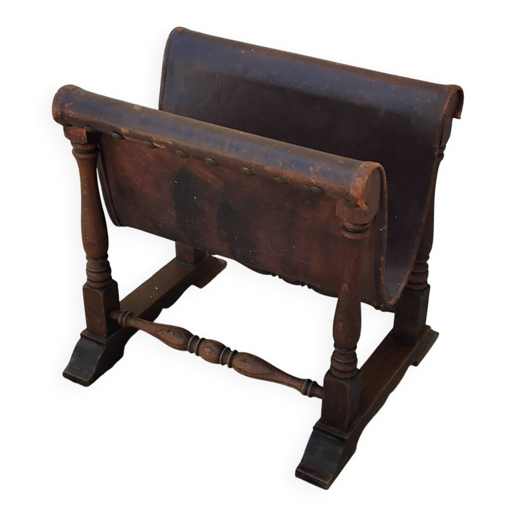 Vintage magazine rack in oak and antique leather