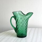 Green blown glass pitcher, unique twisted design