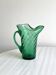 Green blown glass pitcher, unique twisted design