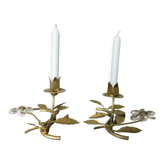 Pair of gilded metal candle holders and tassels