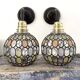 Pair of faceted glass globe wall lights