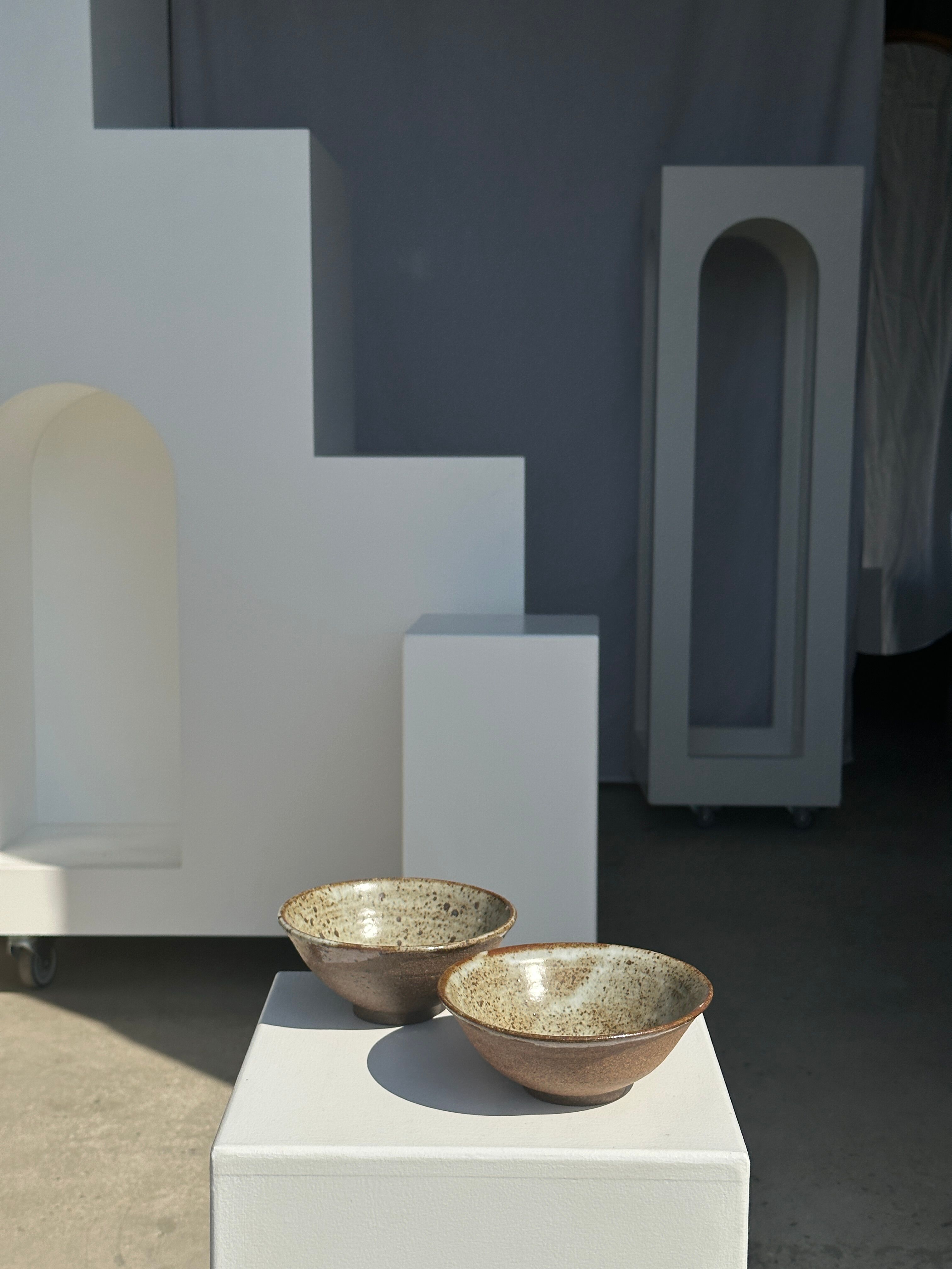 Duo of ceramic bowls interior glazed exterior matt raw earth