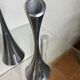 Pair of designer candle holders in stainless steel