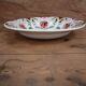 Old hollow earthenware dish with floral decoration Saint Amand
