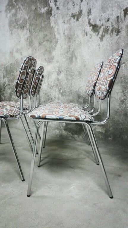 Series of four vintage italian chairs in chrome steel
