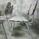 Series of four vintage italian chairs in chrome steel