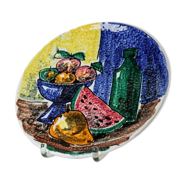 Multicolored hand-painted ceramic wall plate with 1960s Italian fruit motif, signed Stile