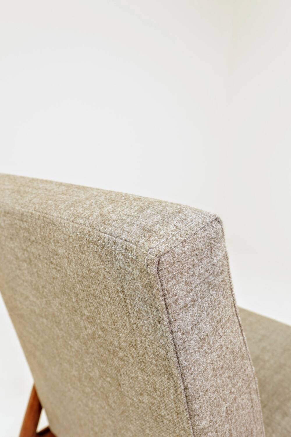 Beige mixed vintage armchair from the 1970s.