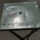 Folding garden or bistro table in khaki sheet metal from the early 1950s.