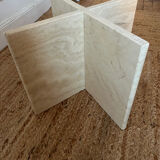 Square coffee table in travertine.
