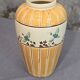 Orange and green ceramic vase with duck motif