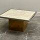 Brute travertine coffee table with brass base and chrome edges, France 1970s.