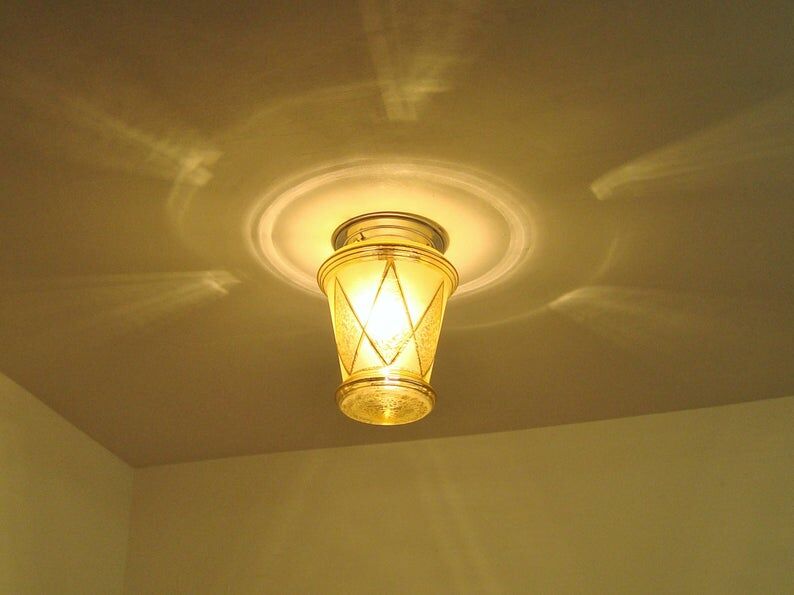 Ancient lantern of the 50s golden glass