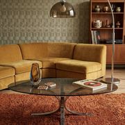 Oval smoked glass coffee table from the 1970s.