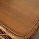 Vintage desk in rattan and wood from the 1960s.