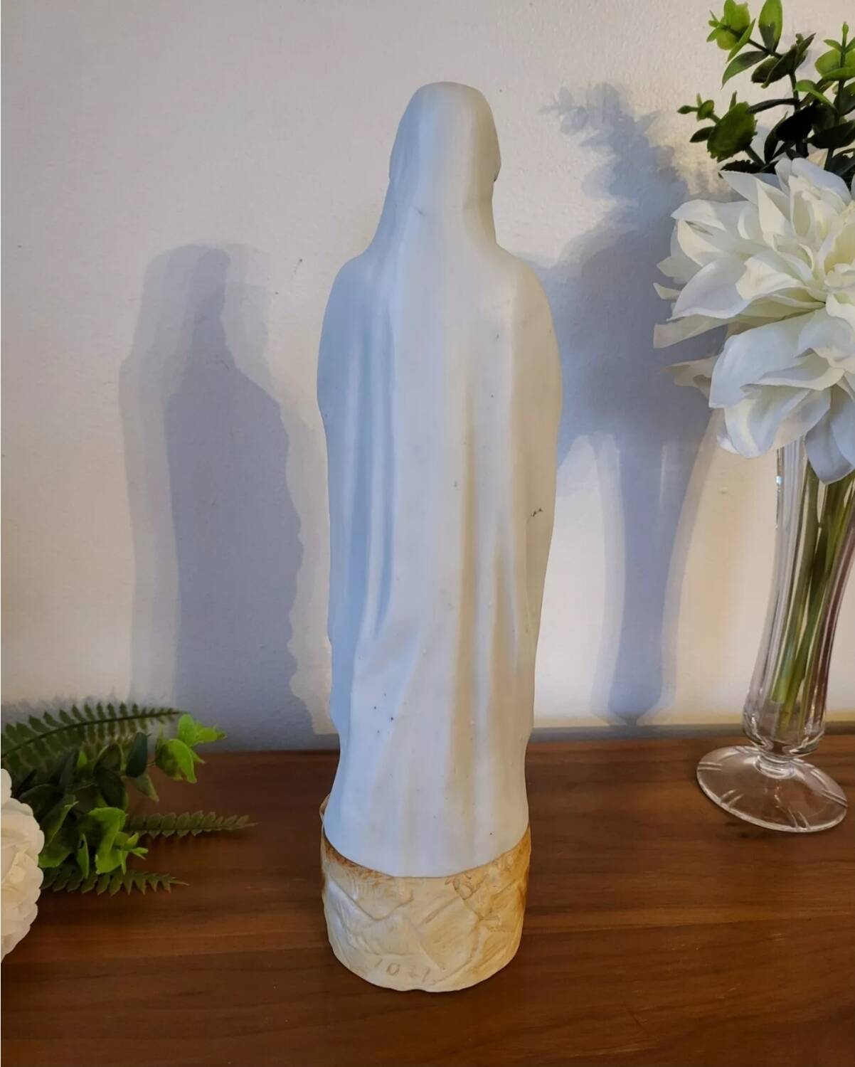 Religious statuette of the Virgin Mary in bisque porcelain