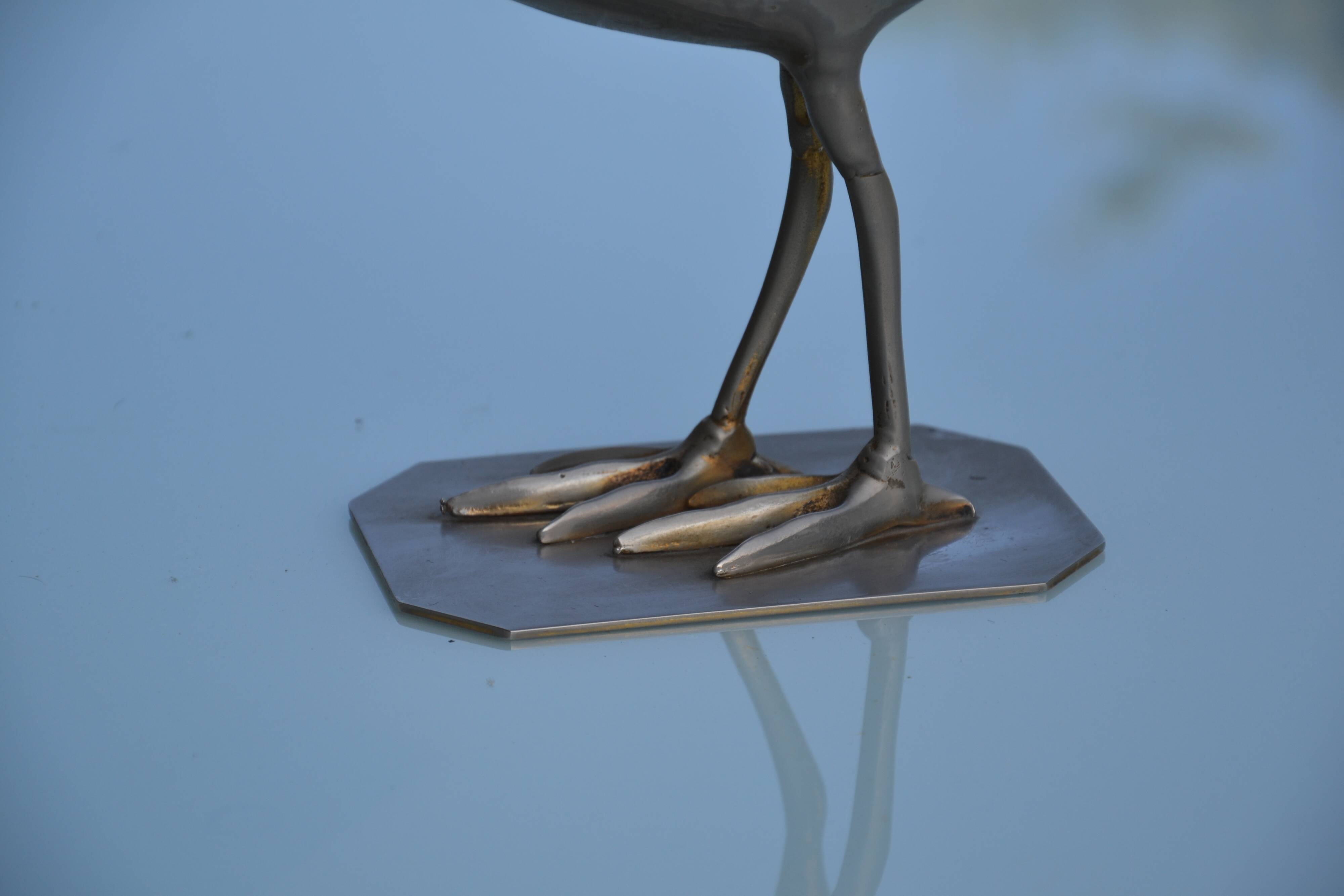 Brass peacock sculpture