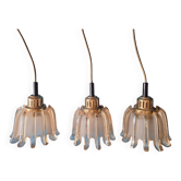 3 suspensions Doria en verre ambré, années 1960