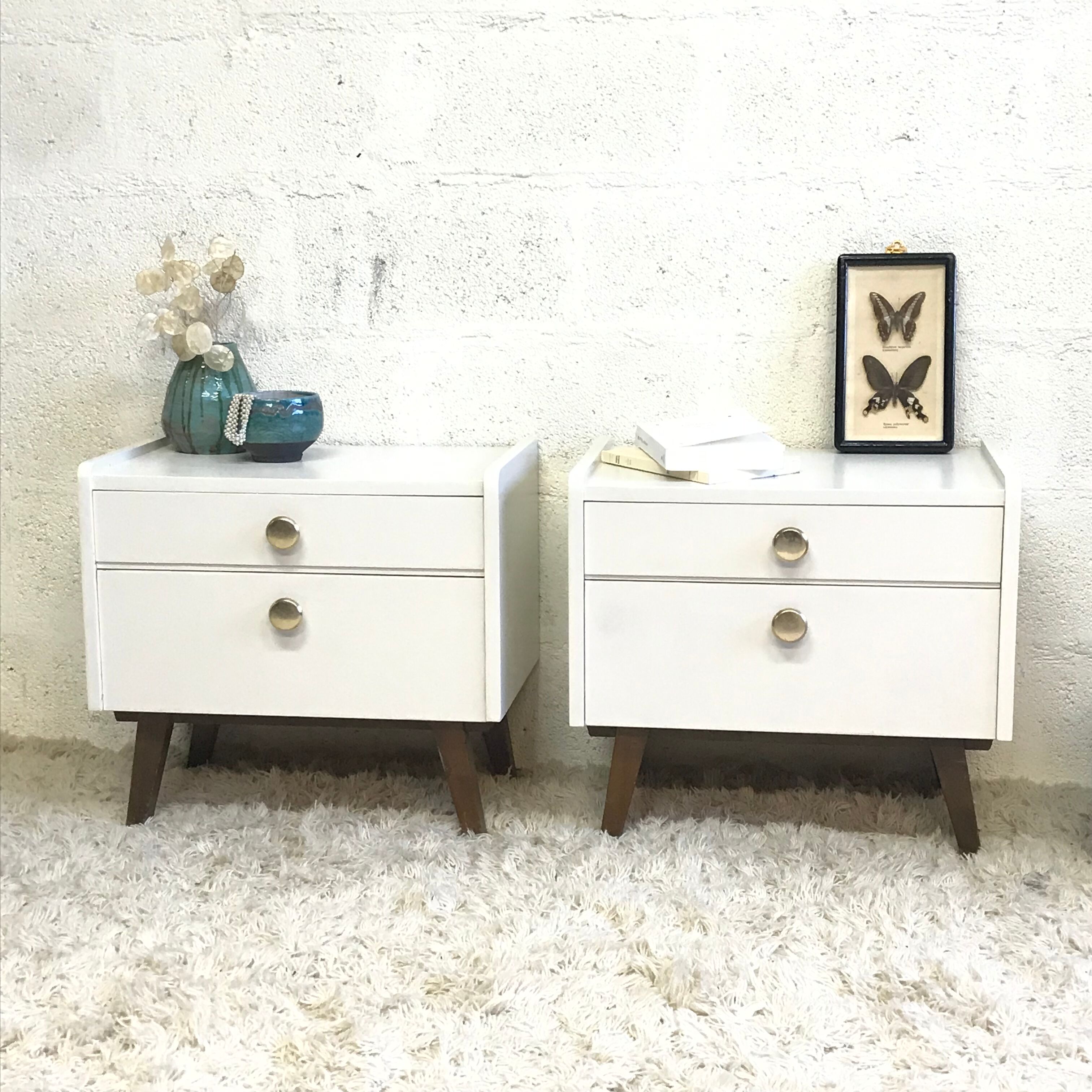 Pair of bedside tables with compass feet