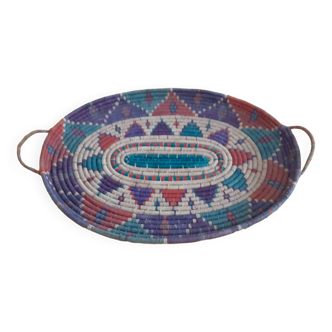 flat basket with 2 handles. Ethnic in multicolored straw.