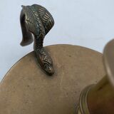 Brass candlestick with chimera decoration