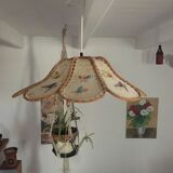 Suspension flower fabric and wood.