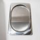 1990s vintage stainless steel platter, rectangular with an oval indentation, minimalist modern design.