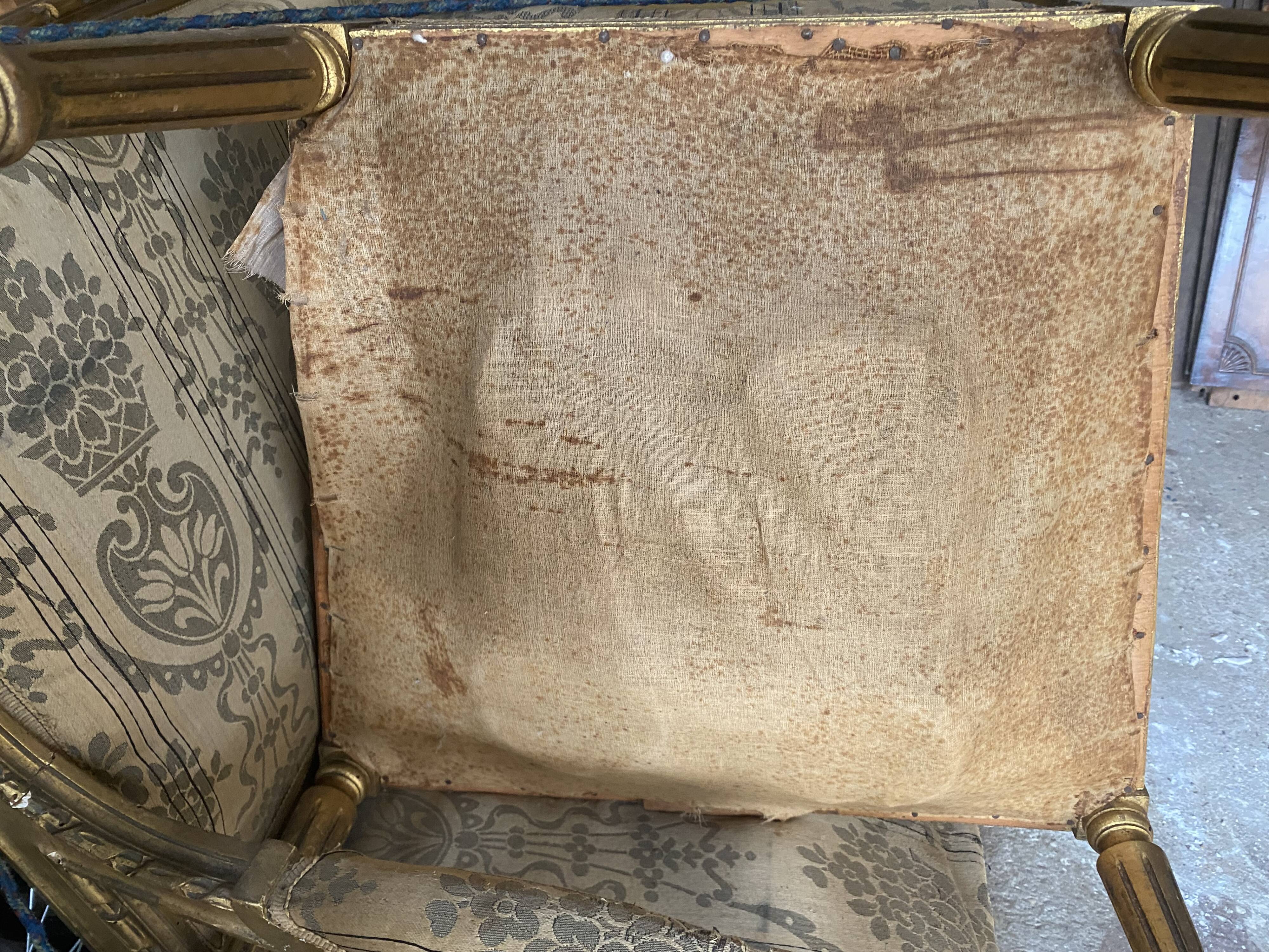 Louis XVI style living room in gilded wood. Napoleon III period