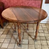 Folding round wooden table