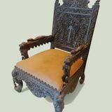 Indian throne chair in carved red wood - Buddhist / Hindu.