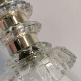 Table lamp made of transparent crystal glass and silver colored spacers.