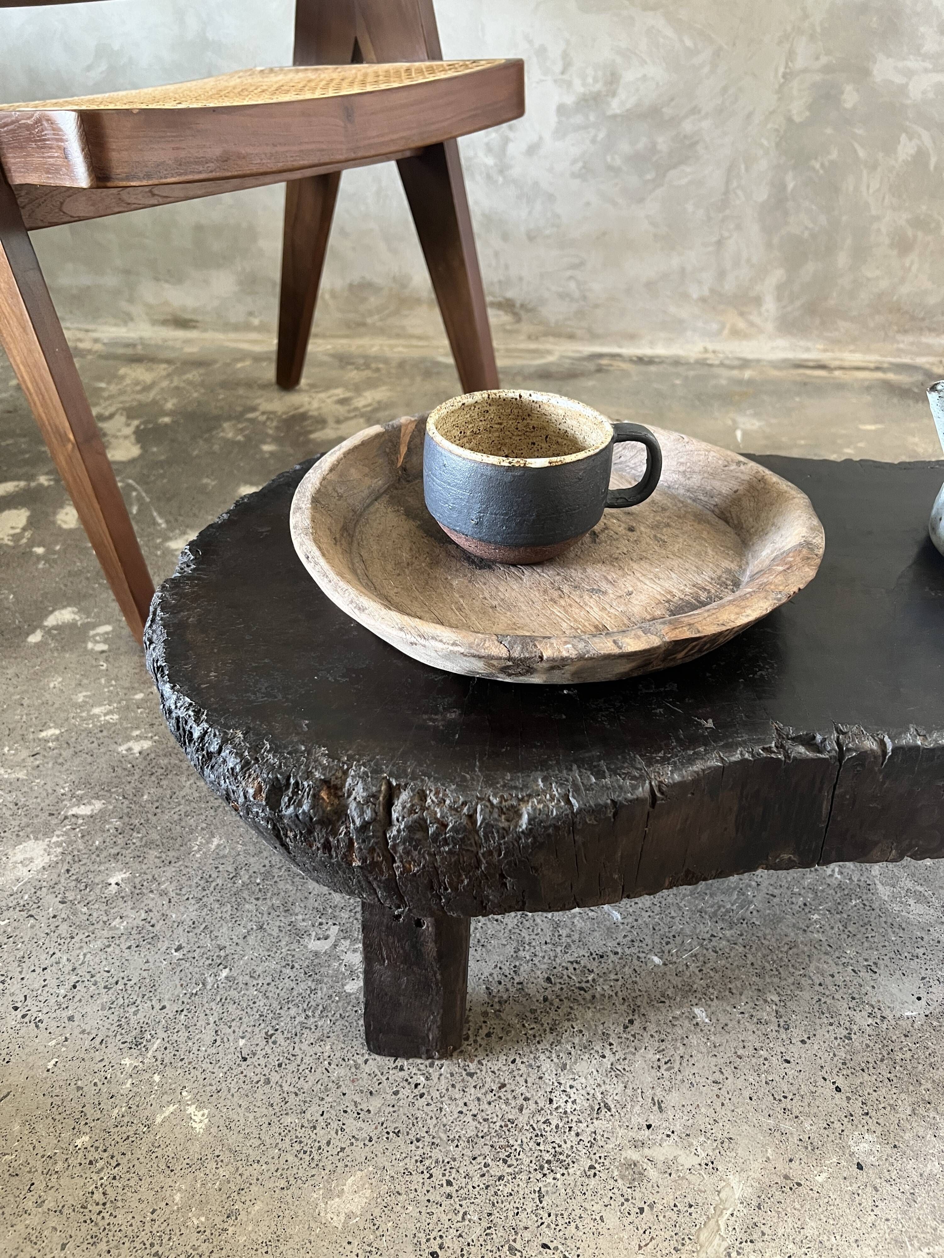 Small old Asian wooden coffee table in Japanese style, kidney-shaped top