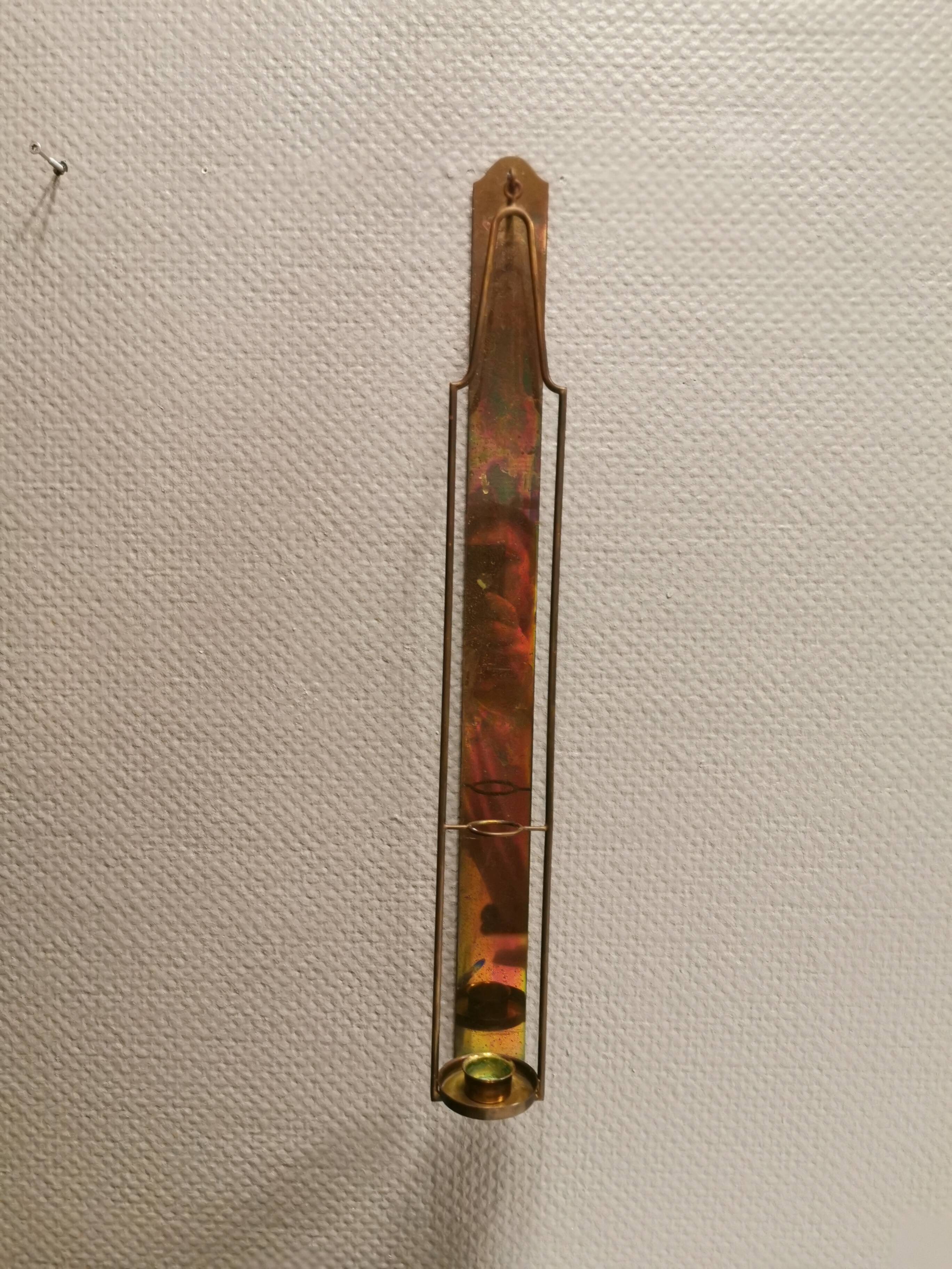 Old Wall hung brass candle holder.