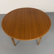Vintage teak extendable round dining table Scandinavian design 1960s