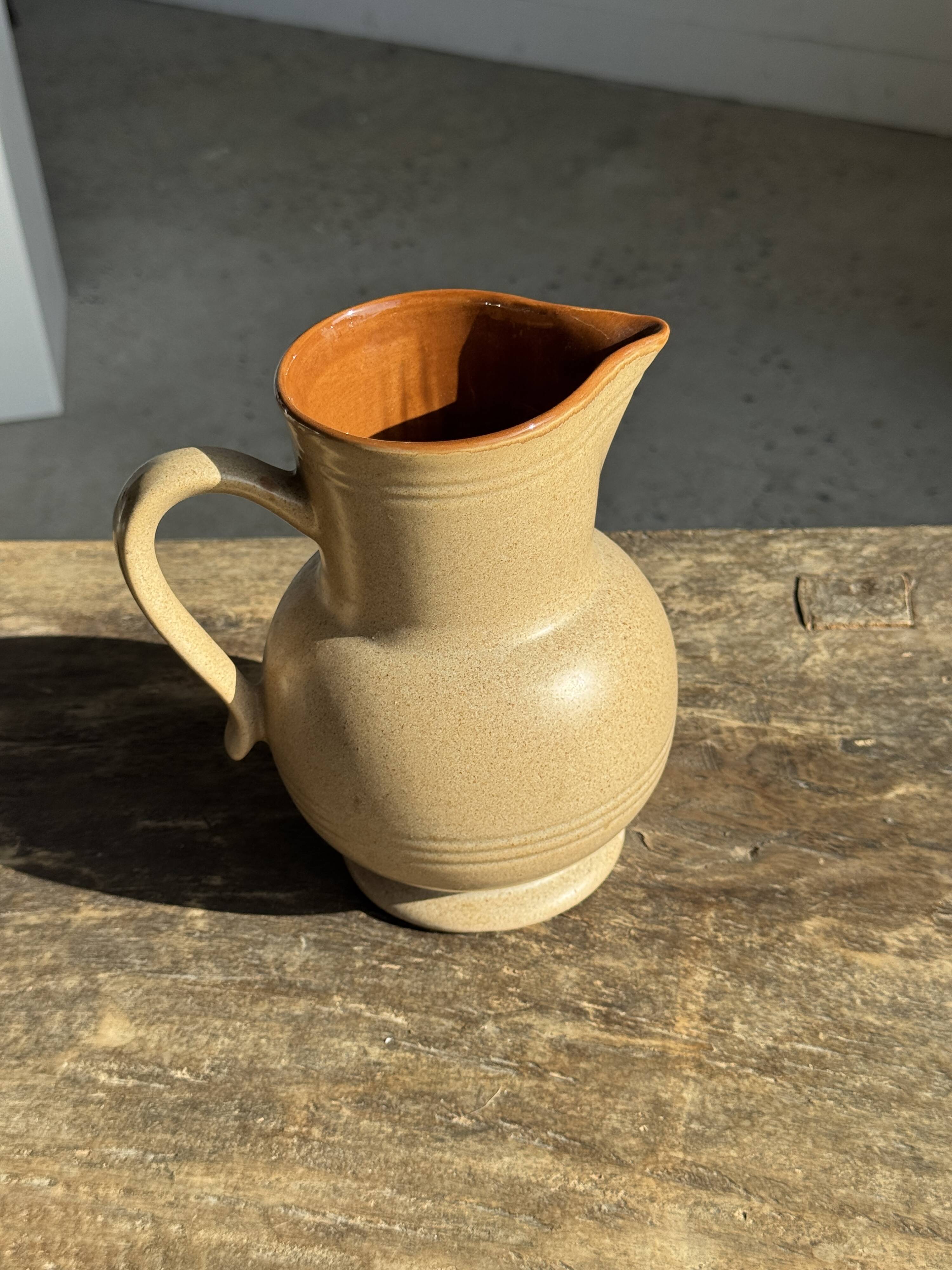 Vintage stoneware round carafe